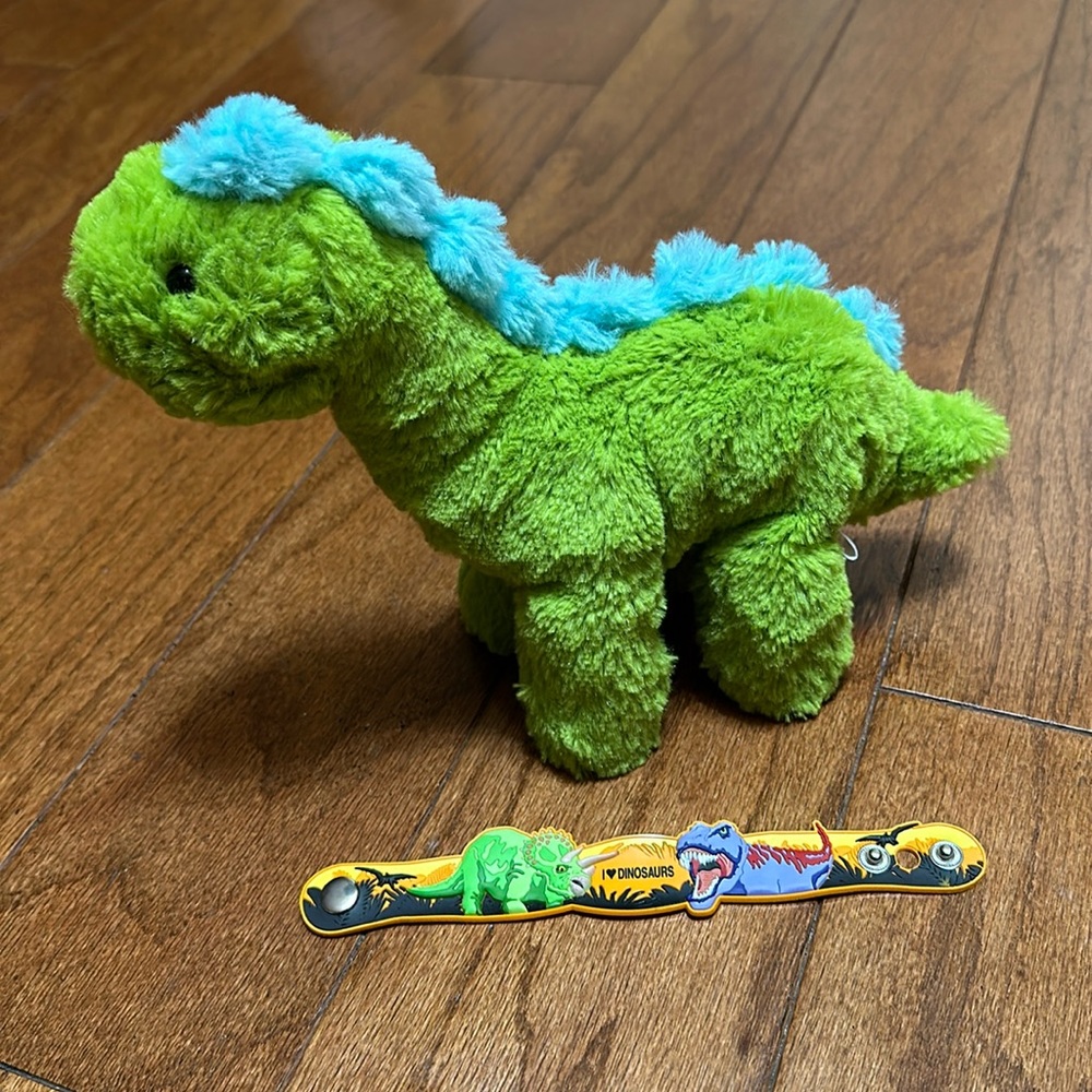 The Manhattan Toy Company plush green dinosaur and bracelet bundle